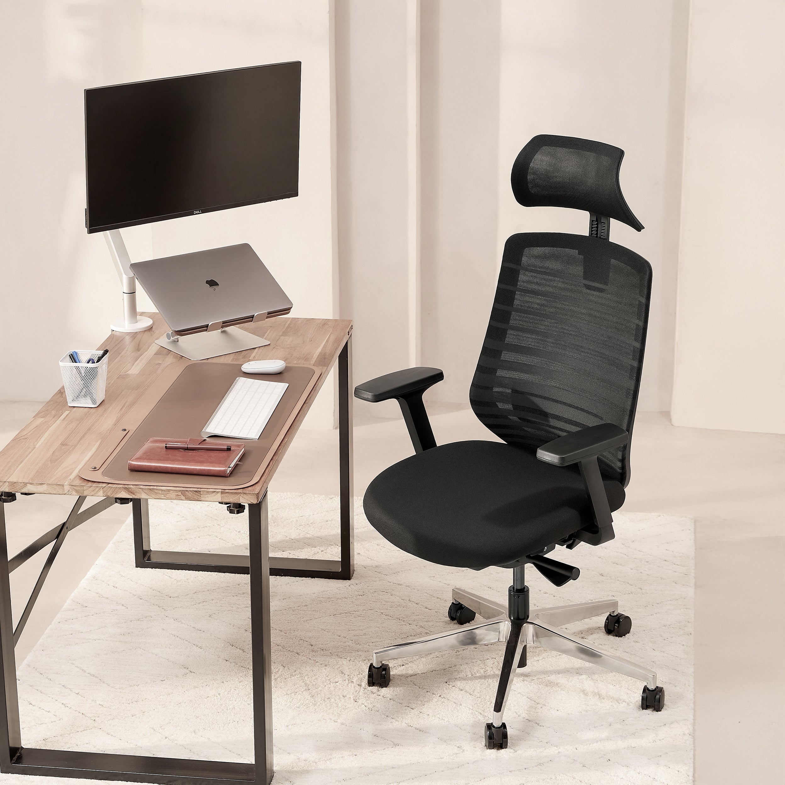 Pelicanwork Model 11 Onyx ergonomic office chair in black at modern desk setup