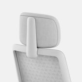 Verve Chair Mist ergonomic office chair headrest detail in light grey mesh
