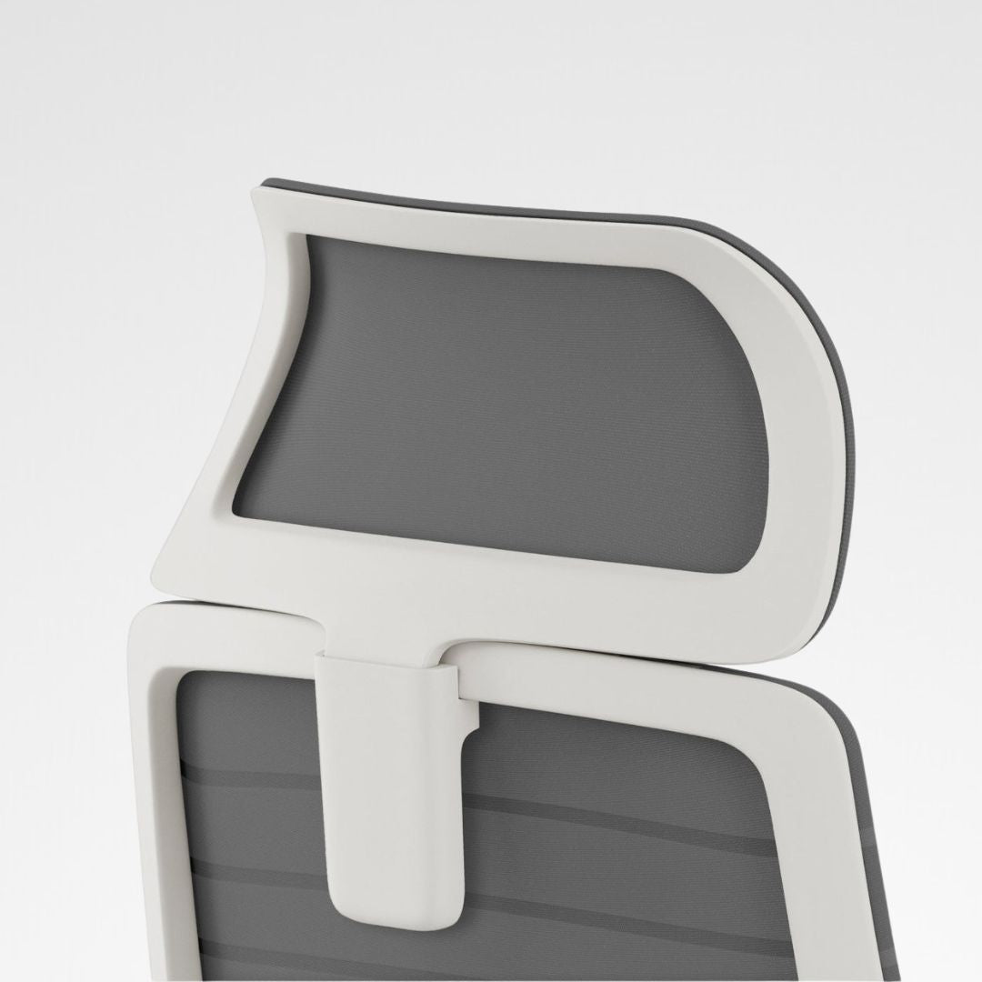Contrast ergonomic office chair grey and white headrest close-up