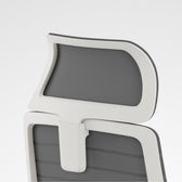 Contrast ergonomic office chair grey and white headrest close-up