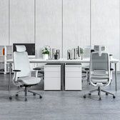 Light grey ergonomic office chairs with headrest in modern workspace, Pelicanwork model 16