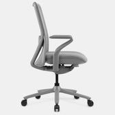 Model 92 G ergonomic office chair in light grey, side view with adjustable armrests