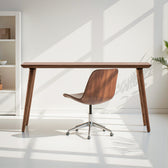 walnut ergonomic office chair and walnut desk in a minimalist home office setting