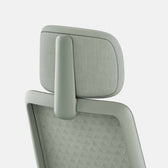 sage green ergonomic office chair with mesh backrest and adjustable headrest
