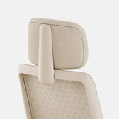 Beige ergonomic office chair headrest and mesh backrest, modern design