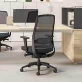 Black mesh ergonomic office chair in modern workspace, Pelicanwork office chair
